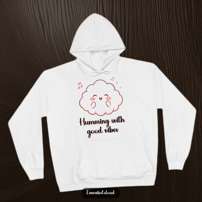 Funny hoodie showcasing a content cloud character humming a peaceful tune, perfect for cozy, music-filled moments.